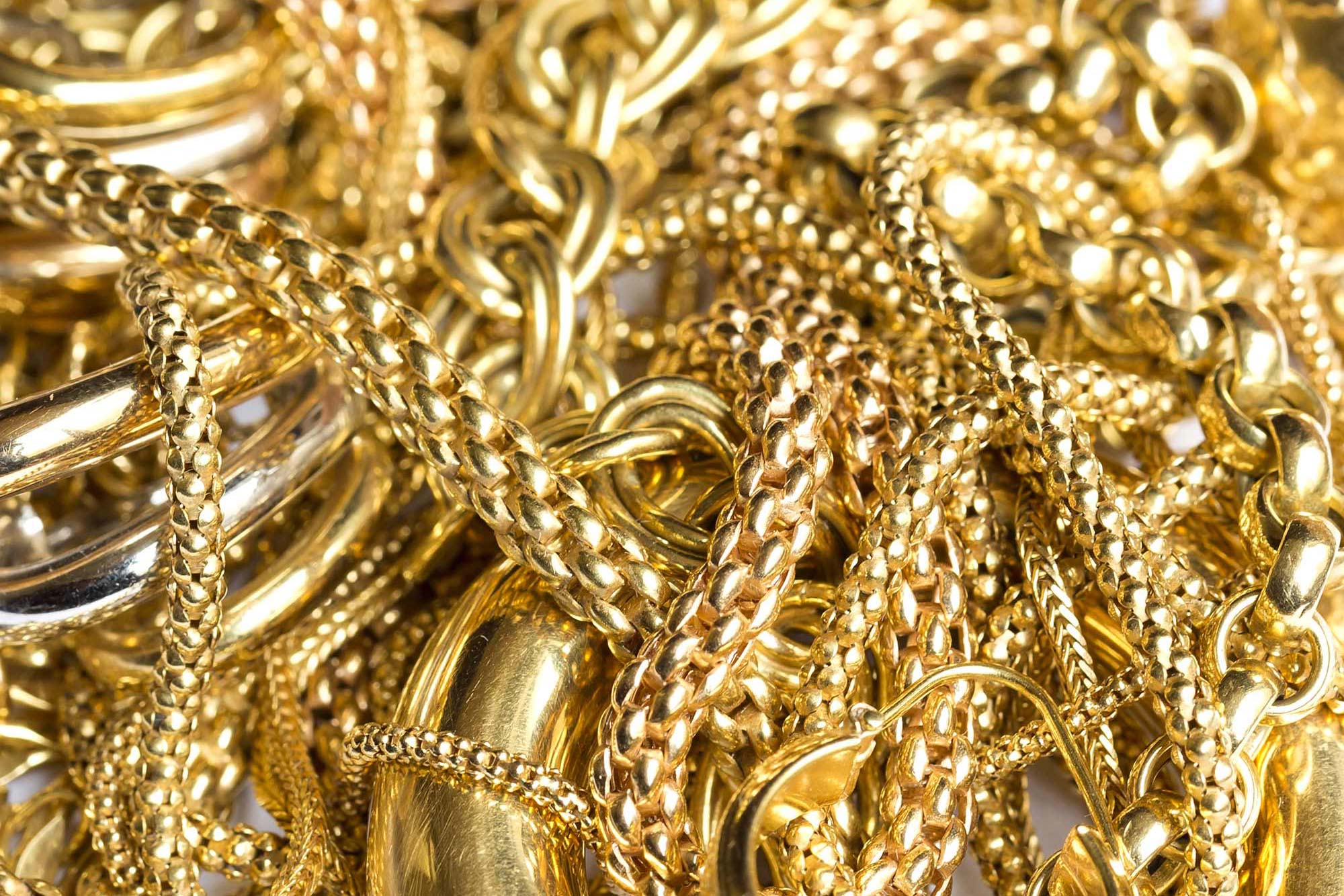 Close Up Shot Of Gold Necklaces And Bracelets